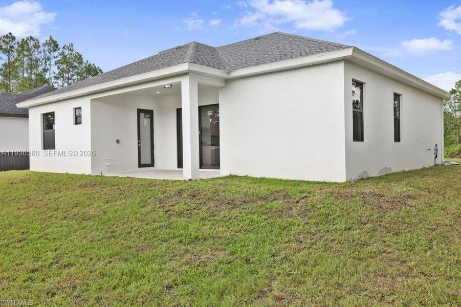 Exterior details and patio area of a home in , Lehigh Acres (Image 19). Exterior details and patio area of a home in , Lehigh Acres (Image 19).