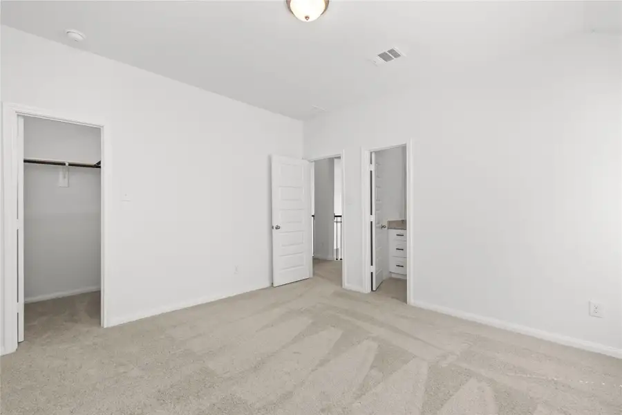 Spacious, unfurnished interior of a new home in Harmony Cove, Humble (Image 25).