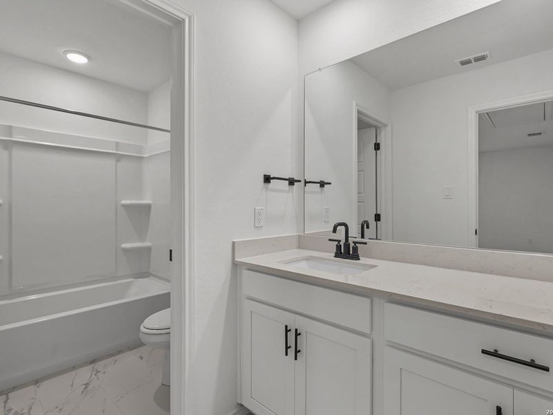 Furnished interior view inside a new home in Meadows at Oak Creek, San Antonio (Image 13).