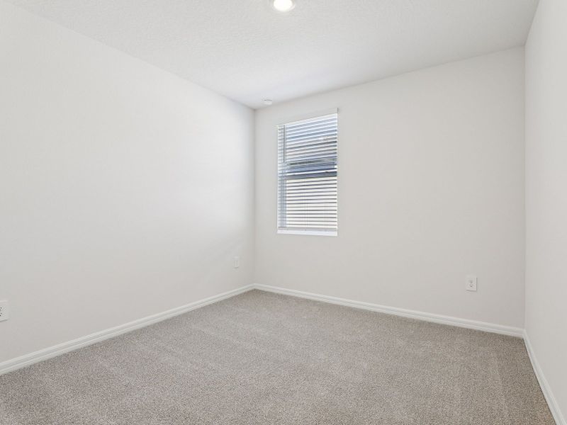 Spacious, unfurnished interior of a new home in Lake Deer Estates - Signature Series, Poinciana (Image 13).