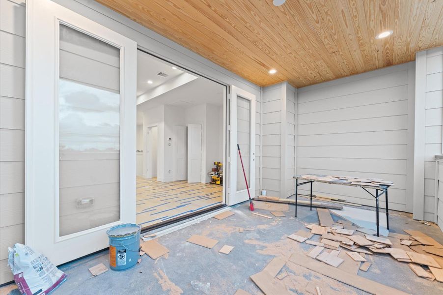 Doors open to the third level rooftop deck. Doors open to the third level rooftop deck.