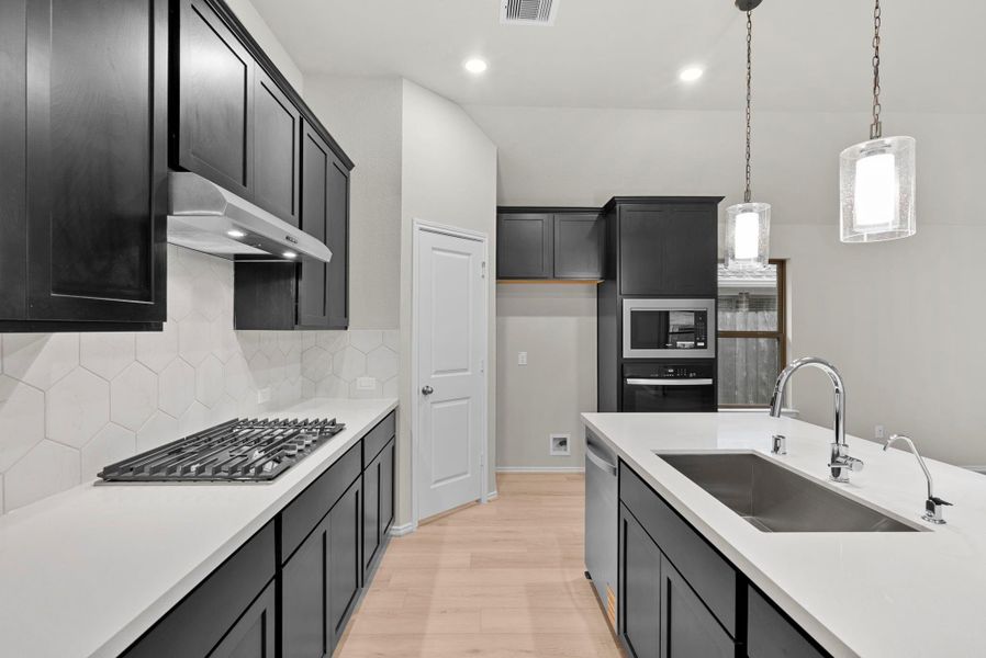 Furnished interior view inside a new home in The Highlands 45', Porter (Image 8).