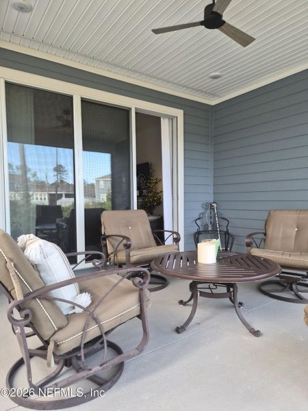 Exterior details and patio area of a home in Condo Collection at Grand Vue at Interlocken, Fernandina Beach (Image 27).