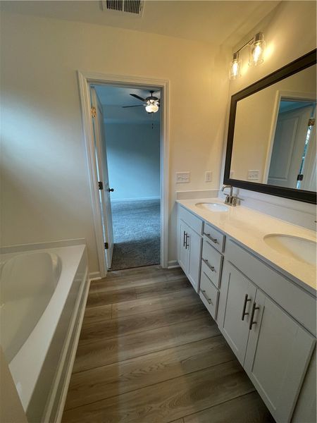 Furnished interior view inside a new home in Springwood Grove, Central (Image 12).