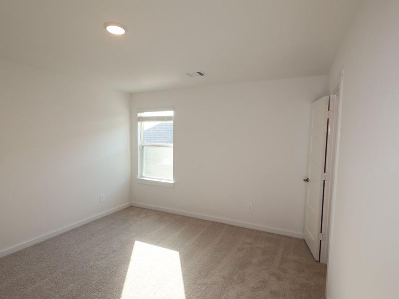 Spacious, unfurnished interior of a new home in Wildrye, Waller (Image 15).