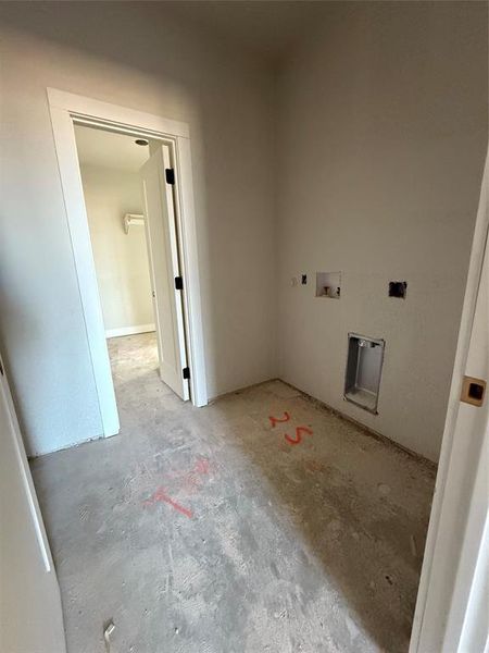 Washroom featuring washer hookup and laundry area