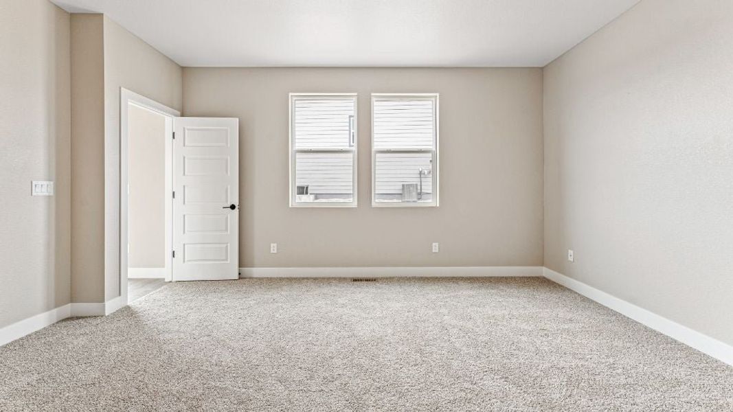 Representative unfurnished interior of a home built from the Pike by Taylor Morrison in The Aurora Highlands Town Collection, Aurora (Image 20).