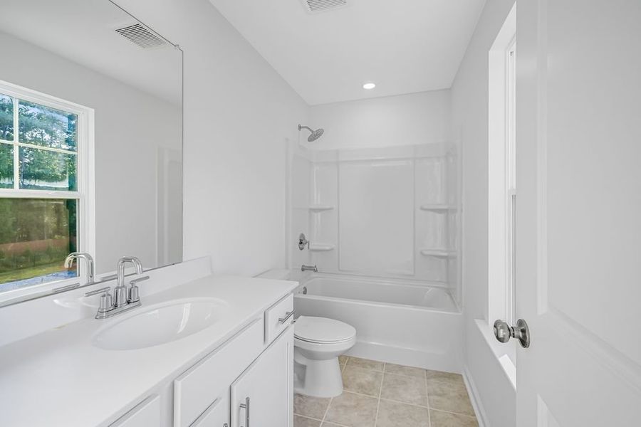 Furnished interior view inside a new home in Chandler Run, Tucker (Image 8).