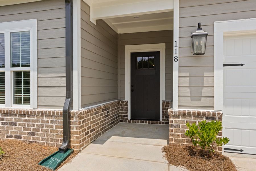 Exterior details and patio area of a home in Cherokee Knoll, Williamston (Image 3).