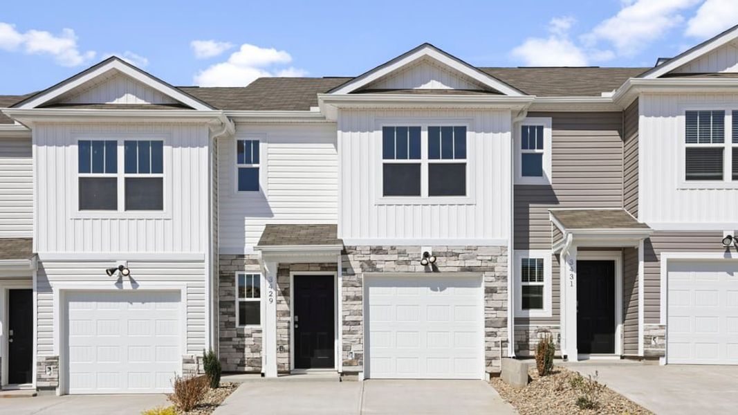 Front exterior of a new home in Baxter Village, Boiling Springs, SC, highlighting curb appeal (Image 1). Front exterior of a new home in Baxter Village, Boiling Springs, SC, highlighting curb appeal (Image 1).