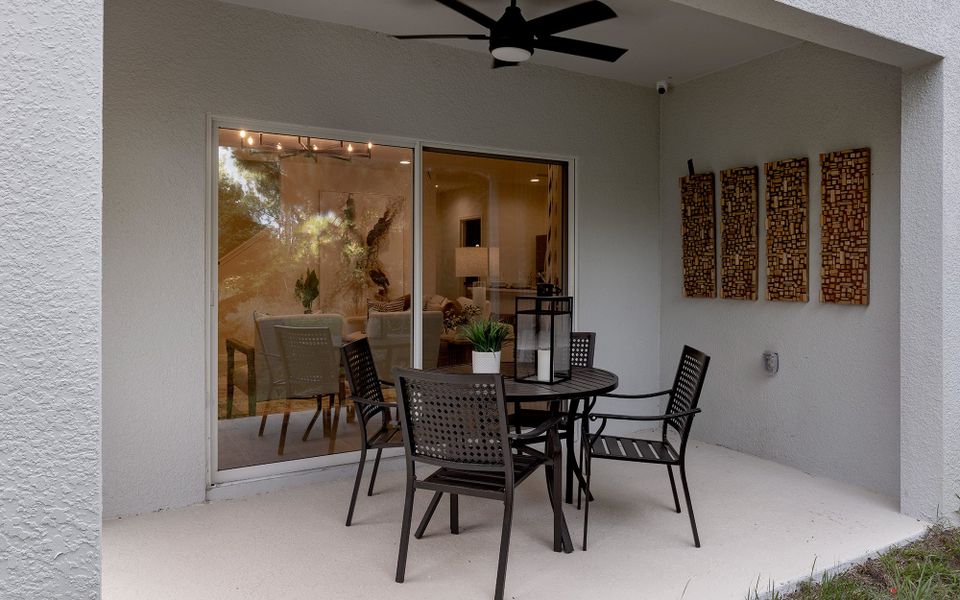 Front exterior of a new home in Blue Springs Reserve Townhomes, Groveland, FL, highlighting curb appeal (Image 8).