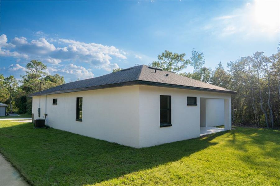 Exterior details and patio area of a home in , Brooksville (Image 2).