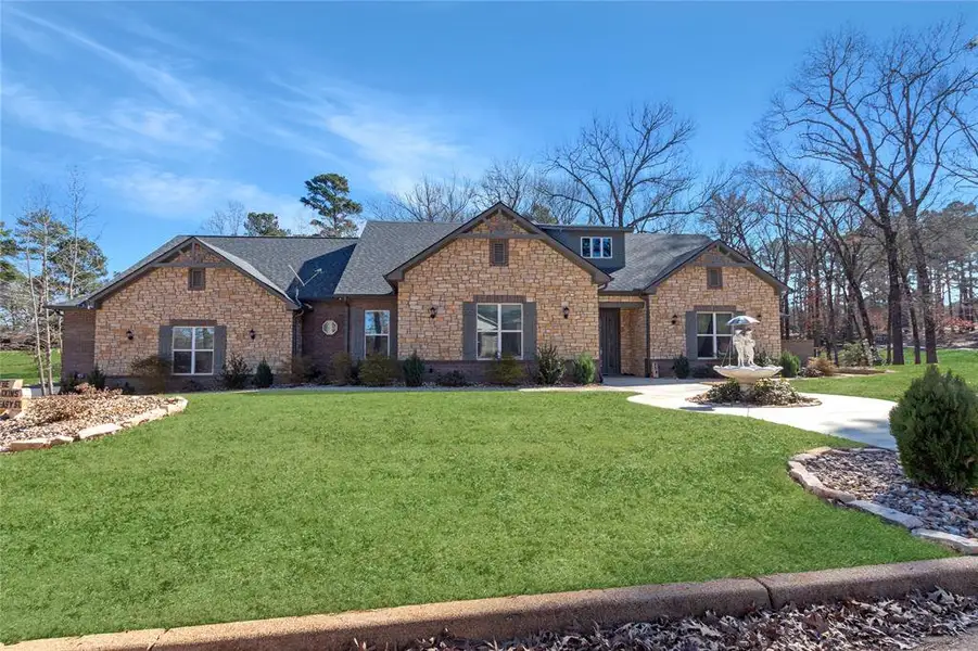 Front exterior of a new home in , Frankston, TX, highlighting curb appeal (Image 1). Front exterior of a new home in , Frankston, TX, highlighting curb appeal (Image 1).