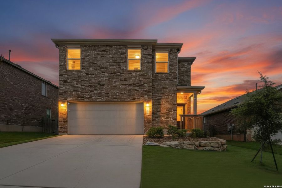 Front exterior of a new home in Hidden Trails, Bulverde, TX, highlighting curb appeal (Image 18). Front exterior of a new home in Hidden Trails, Bulverde, TX, highlighting curb appeal (Image 18).