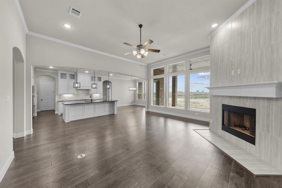 Family Room | Concept 2915 at Hidden Creek Estates in Van Alstyne, TX by Landsea Homes