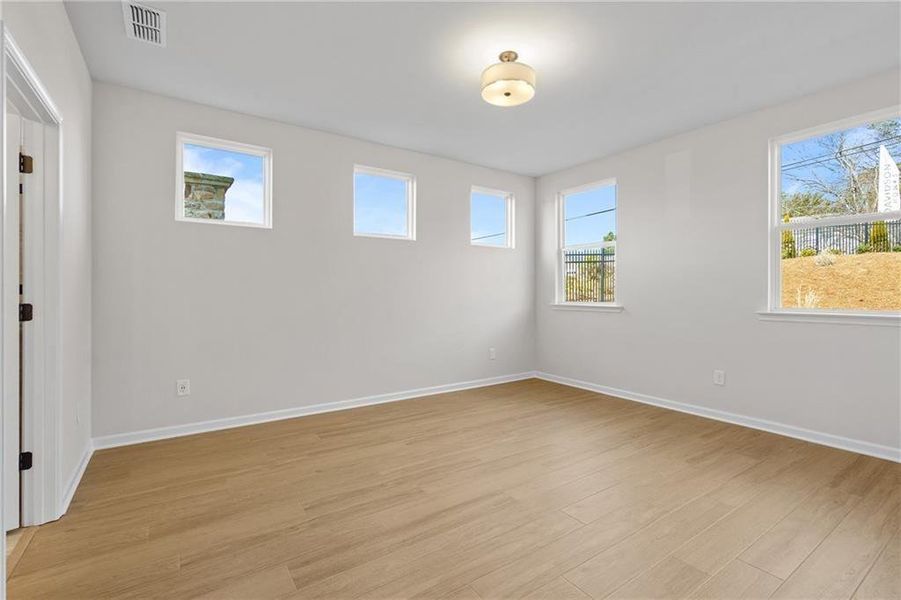 Spacious, unfurnished interior of a new home in Kelly Preserve, Loganville (Image 11).