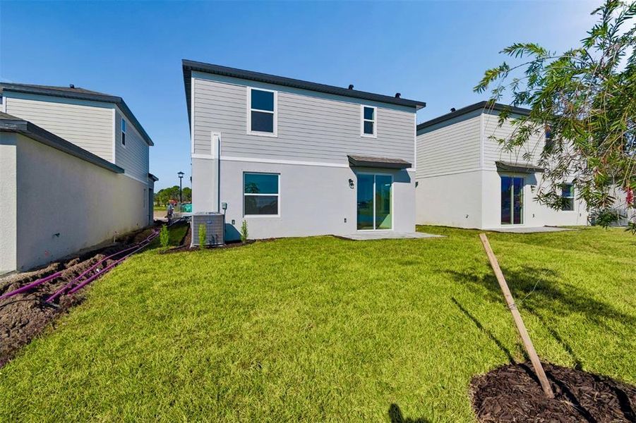Exterior details and patio area of a home in Southpointe, Palmetto (Image 3).
