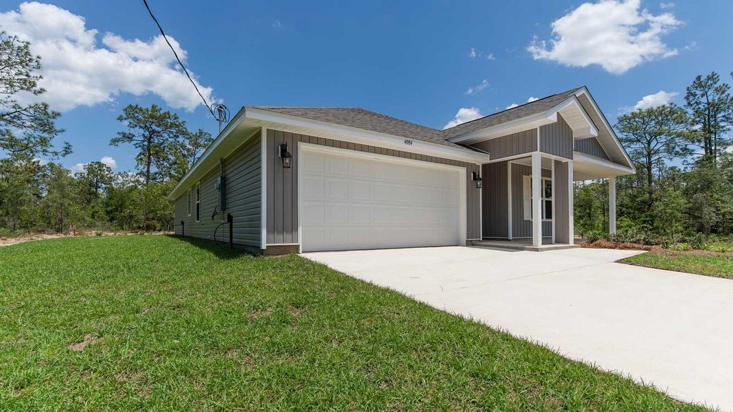 Representative exterior photo of a completed home built from the Cali by D.R. Horton in Sunny Hills, Chipley, FL (Image 2). Representative exterior photo of a completed home built from the Cali by D.R. Horton in Sunny Hills, Chipley, FL (Image 2).
