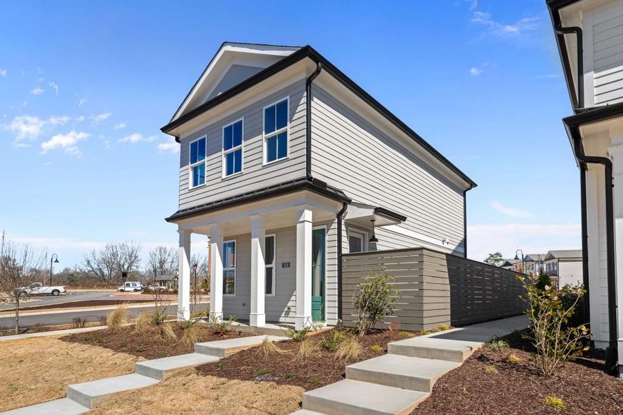 Front exterior of a new home in Harmony, Auburn, GA, highlighting curb appeal (Image 22).