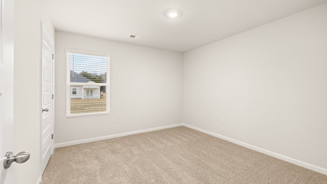 Representative unfurnished interior of a home built from the Galen by D.R. Horton in Preserve at Dove Creek, Statham (Image 26).