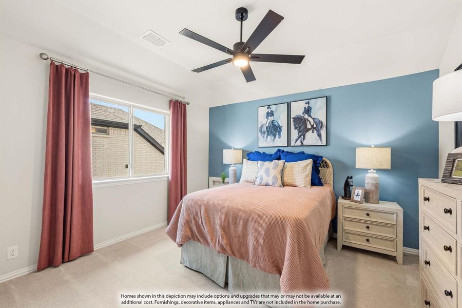 Bedroom with blue accent wall, ceiling fan, and carpet flooring with a queen bed and nightstands