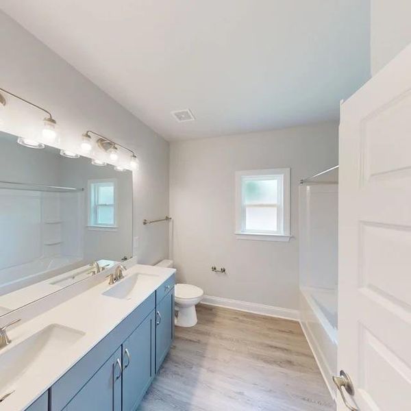 Furnished interior view inside a new home in Mirror Lake at South Harbour, Villa Rica (Image 8).