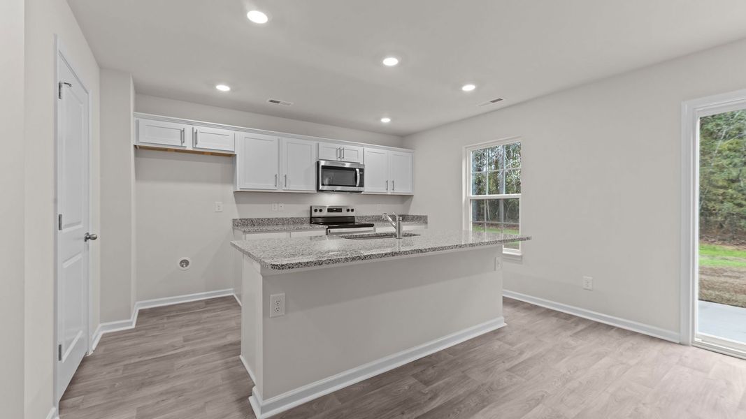 Furnished interior view inside a new home in Blair Ridge, La Grange (Image 4).
