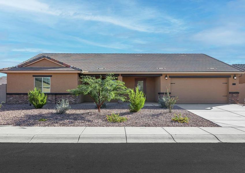 This home has a 2-car garage and gorgeous stone detailing.