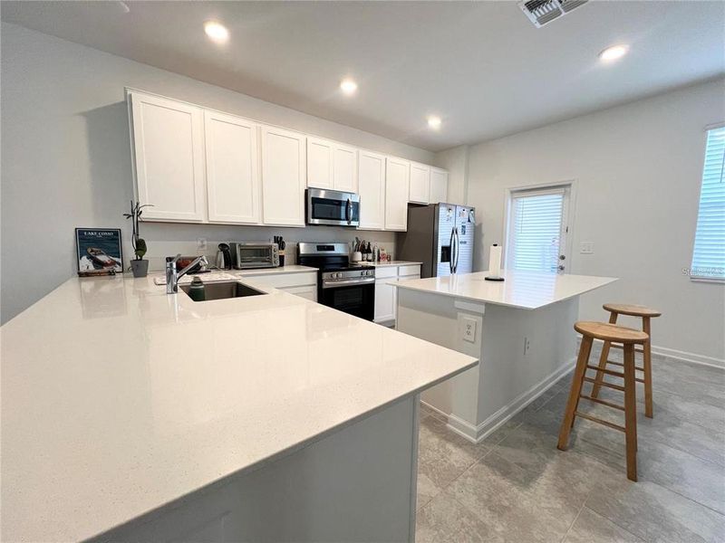 Furnished interior view inside a new home in , Clermont (Image 17).