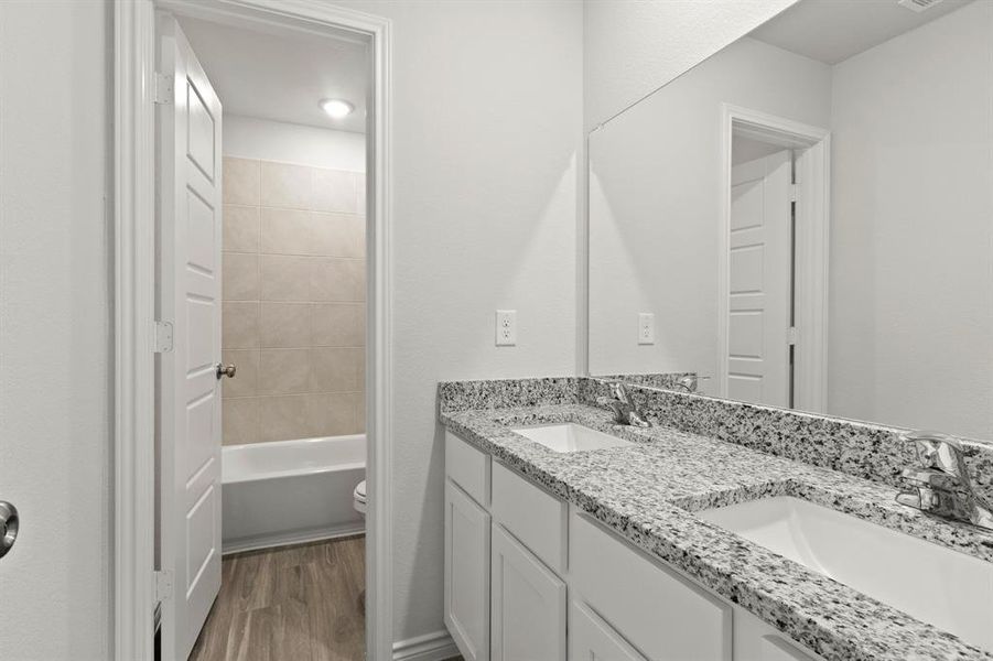 Furnished interior view inside a new home in Retreat at Fossil Creek, Fort Worth (Image 9).