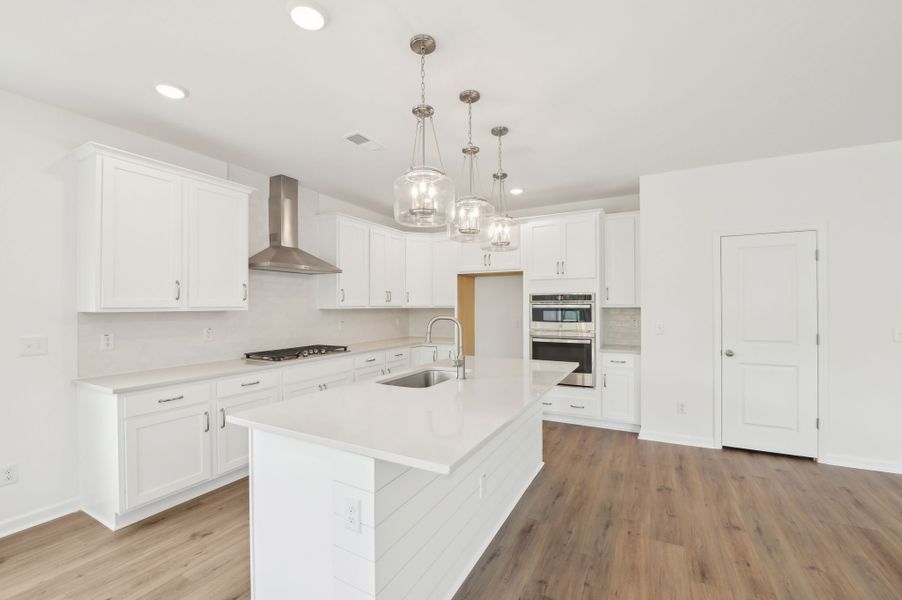 Representative furnished interior of a home built from the Alexis by Ashton Woods in Rowland's Grant, Fuquay Varina (Image 9).