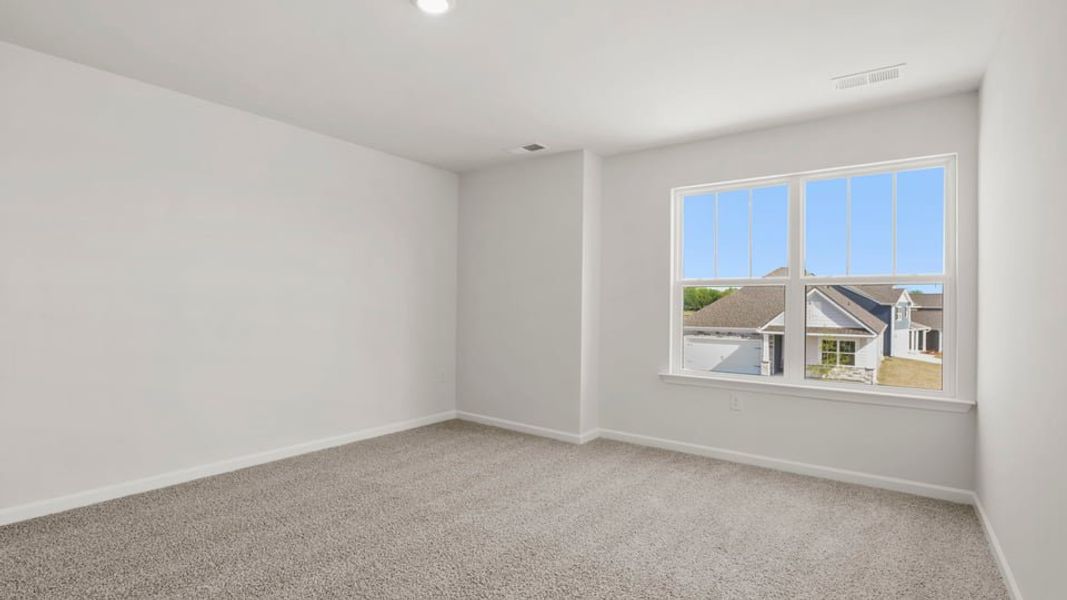 Spacious, unfurnished interior of a new home in Durbin Meadows Traditions, Fountain Inn (Image 28).