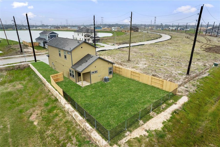 Aerial view of oversize backyard, great for family entertainment.