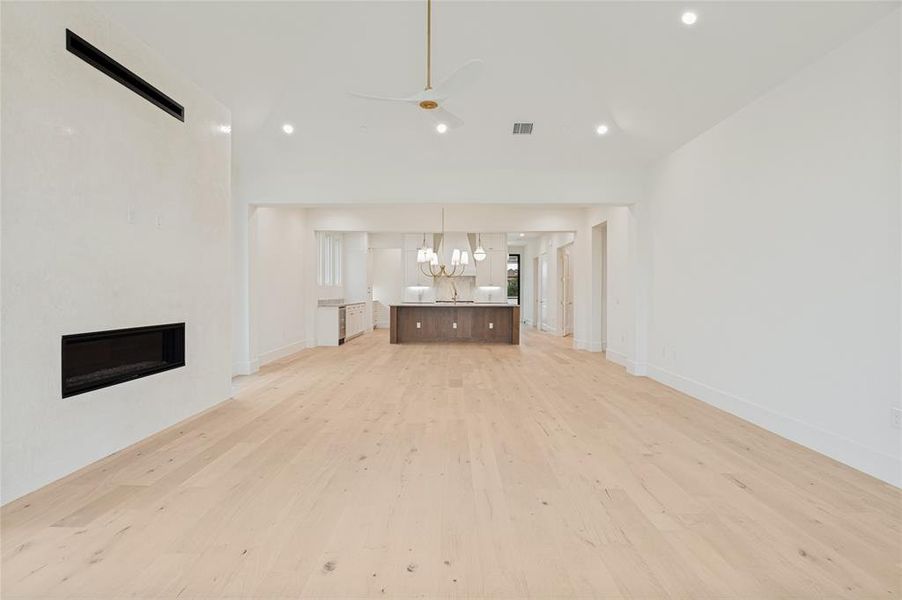 An expansive open-concept floorplan enhanced by 13-foot ceilings