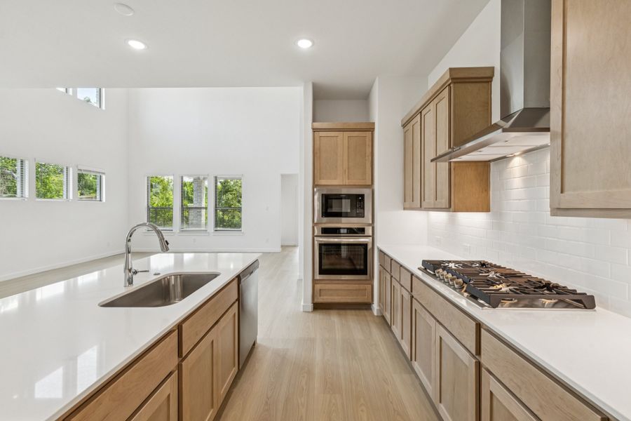 Kitchen in the Da Vinci II home plan by Trophy Signature Homes – REPRESENTATIVE PHOTO Kitchen in the Da Vinci II home plan by Trophy Signature Homes – REPRESENTATIVE PHOTO