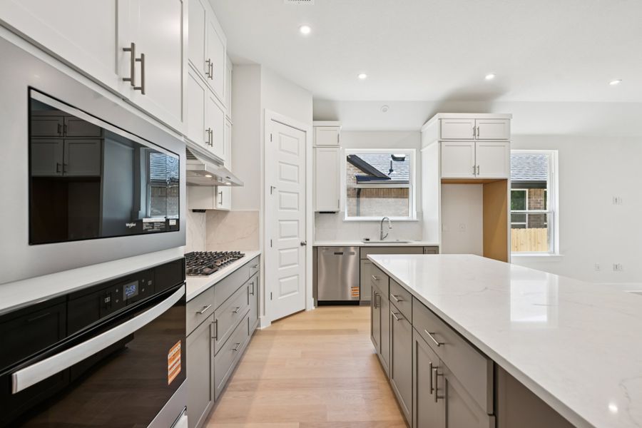 Furnished interior view inside a new home in Persimmon, Buda (Image 6).