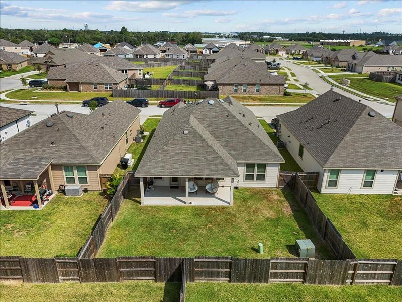 Front exterior of a new home in , Alvin, TX, highlighting curb appeal (Image 23).
