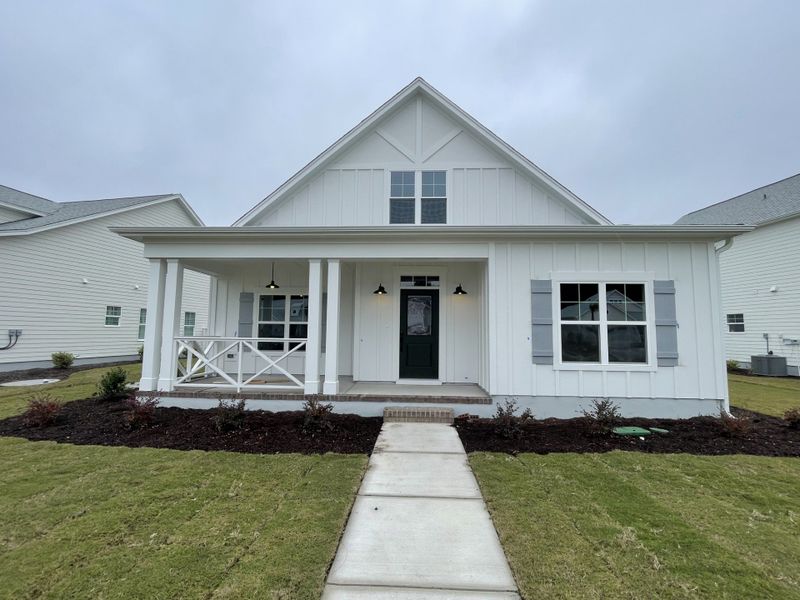 Exterior details and patio area of a home in The Sanctuary at Sunset Beach, Sunset Beach (Image 3).