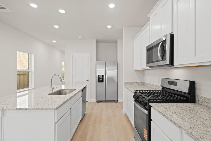 Furnished interior view inside a new home in Riverwood Ranch, Angleton (Image 8).