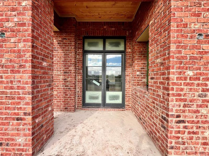 View of exterior entry with french doors