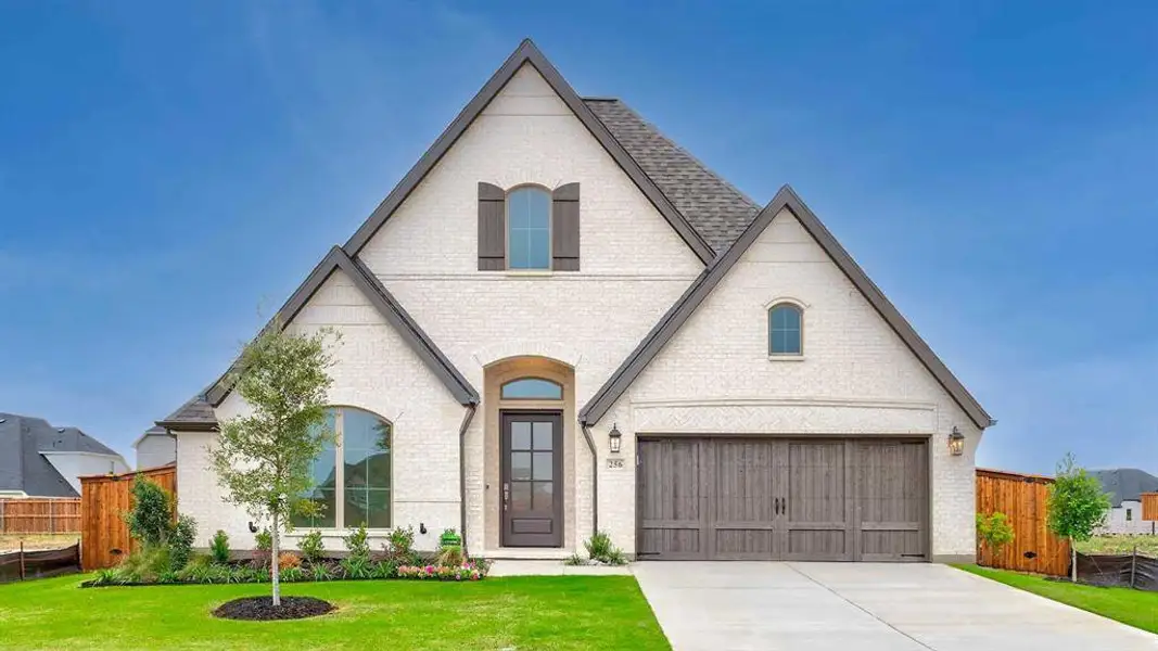 Front exterior of a new home in Myrtle Creek 60', Waxahachie, TX, highlighting curb appeal (Image 1).