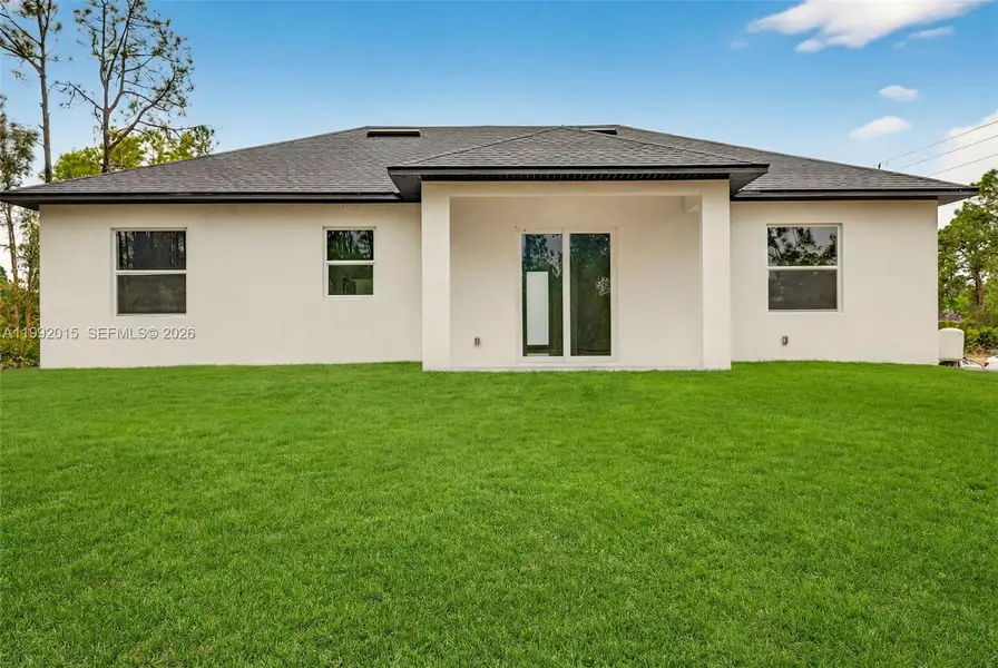 Exterior details and patio area of a home in , Lehigh Acres (Image 3).