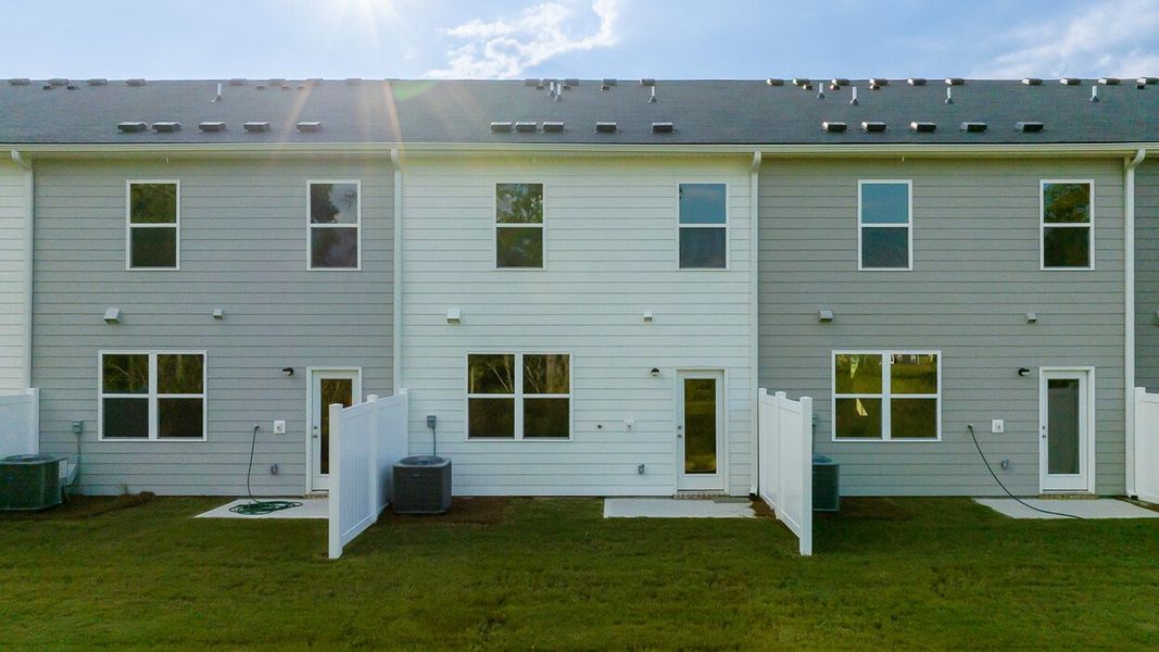 Exterior details and patio area of a home in The Gables at Agricultural Village, Perry (Image 2).