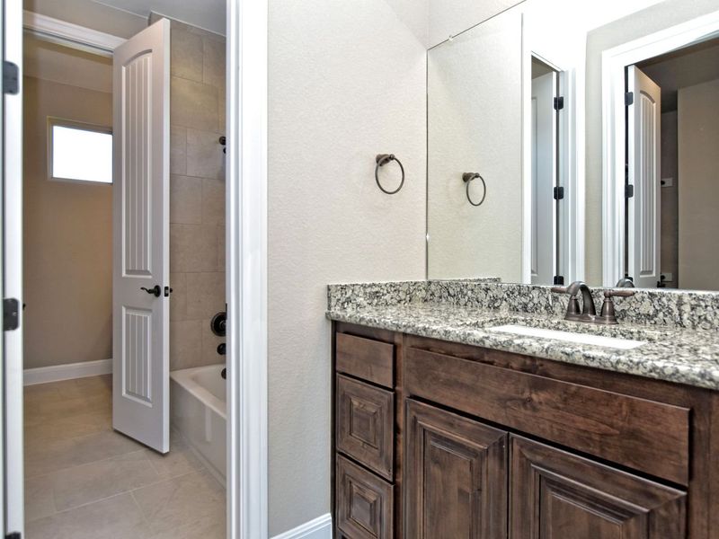 Representative furnished interior of a home built from the Catalina by Giddens Homes in Clearwater Ranch, Liberty Hill (Image 9).