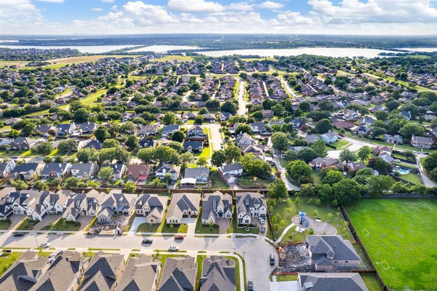 Lake Ray Hubbard Proximity - Just minutes from the water, this aerial shot shows the home’s location near Lake Ray Hubbard, with access to recreation, dining, and nature. Lake Ray Hubbard Proximity - Just minutes from the water, this aerial shot shows the home’s location near Lake Ray Hubbard, with access to recreation, dining, and nature.