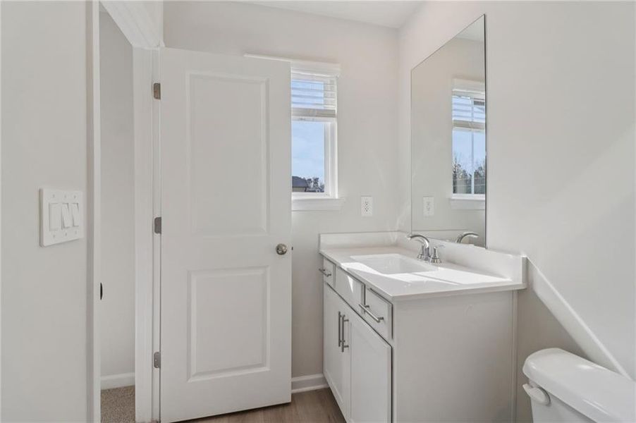 Furnished interior view inside a new home in Harmony Manor, Fairburn (Image 13).
