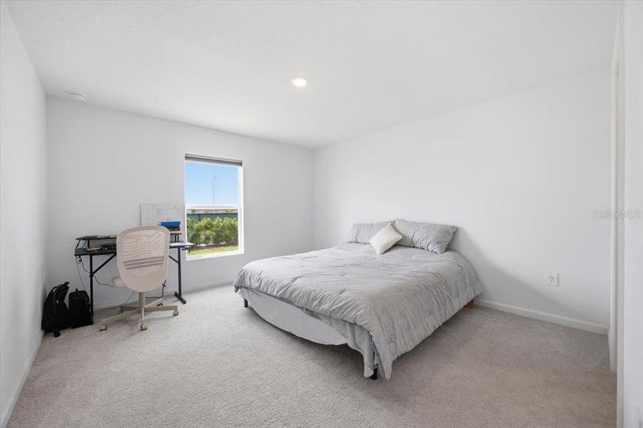 Furnished interior view inside a new home in Hunt Club Groves, Lake Wales (Image 15).
