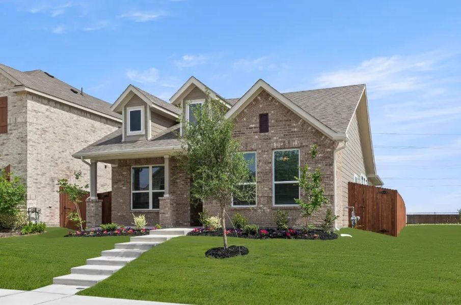 Front exterior of a new home in Heartland, Heartland, TX, highlighting curb appeal (Image 6). Front exterior of a new home in Heartland, Heartland, TX, highlighting curb appeal (Image 6).