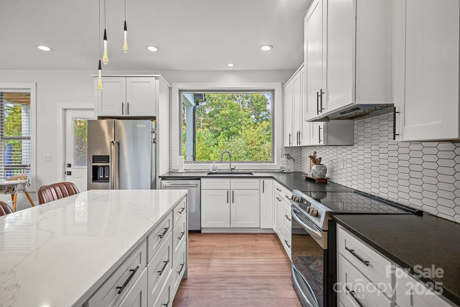 Furnished interior view inside a new home in , Candler (Image 18).
