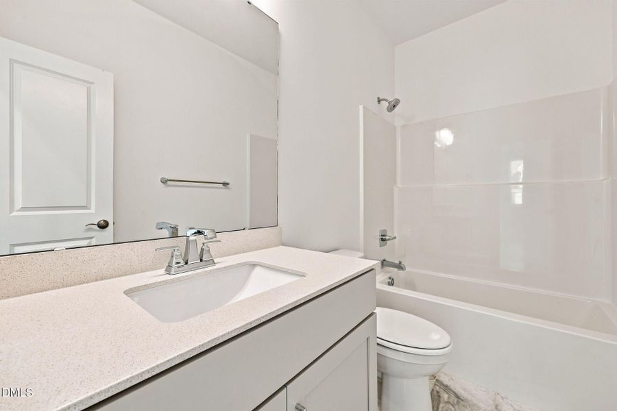 Furnished interior view inside a new home in The Cottages at 78 North, Sanford (Image 28).